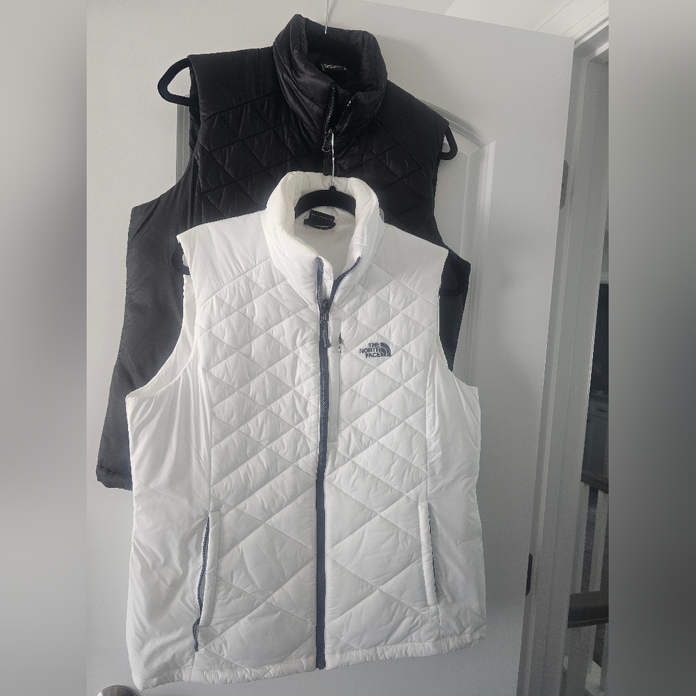 NOT FOR SALE......  North Face Quilted White Vests